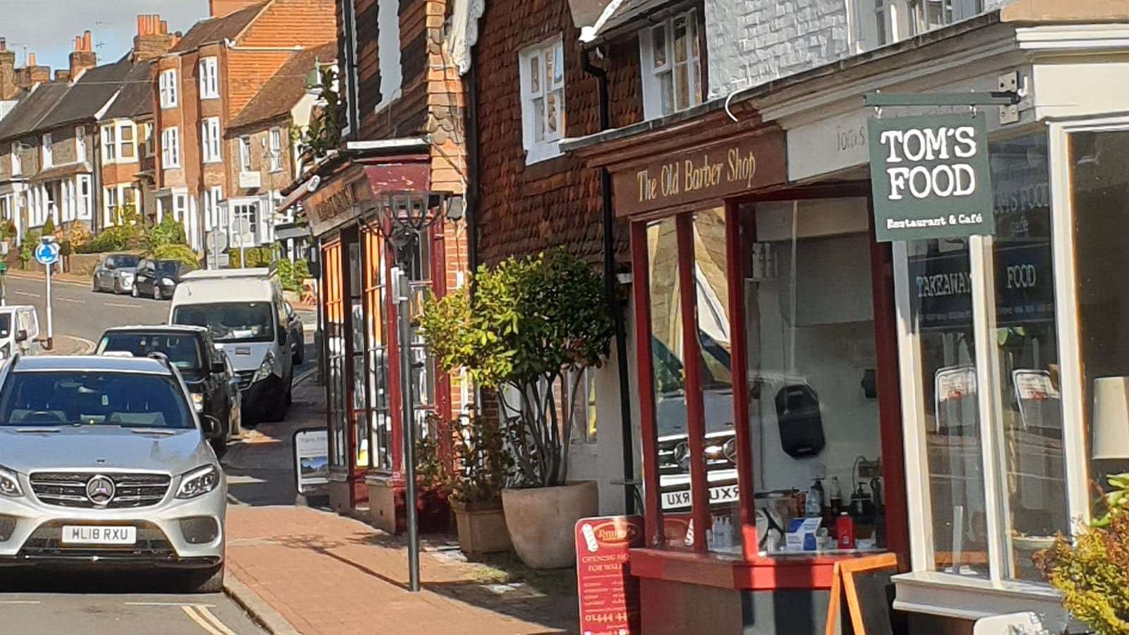 Shops and csars in village high street