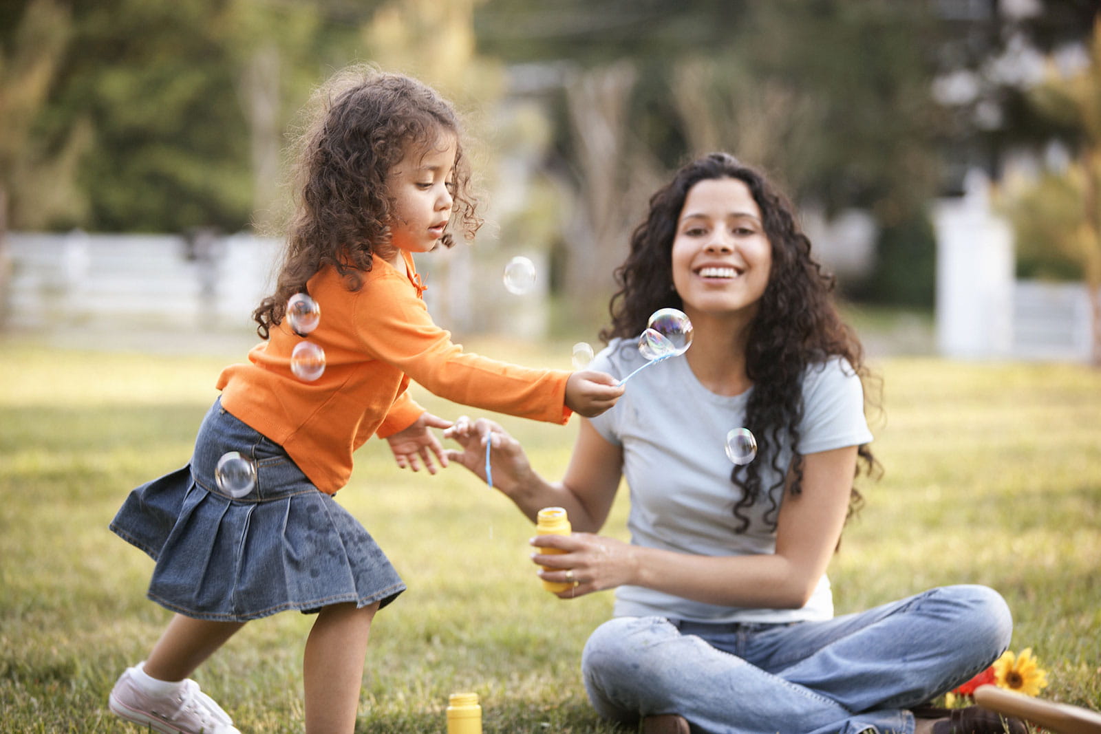 Female adult and child at a park