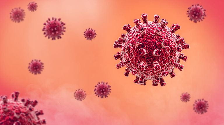 COVID-19 virus on orange background